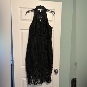 Midi black lace overlay dress.